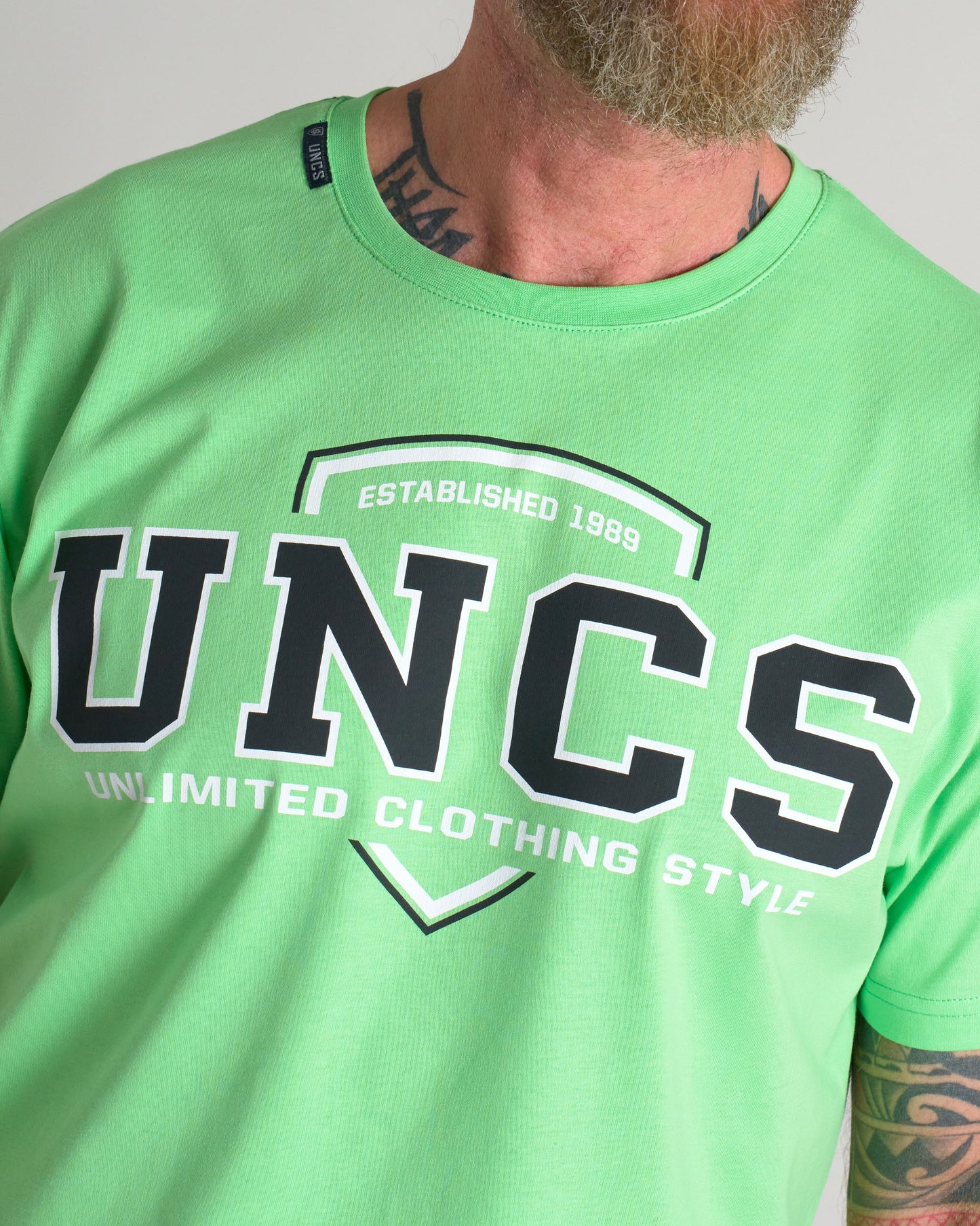 Férfi póló UNCS TEAM II GREEN NEON