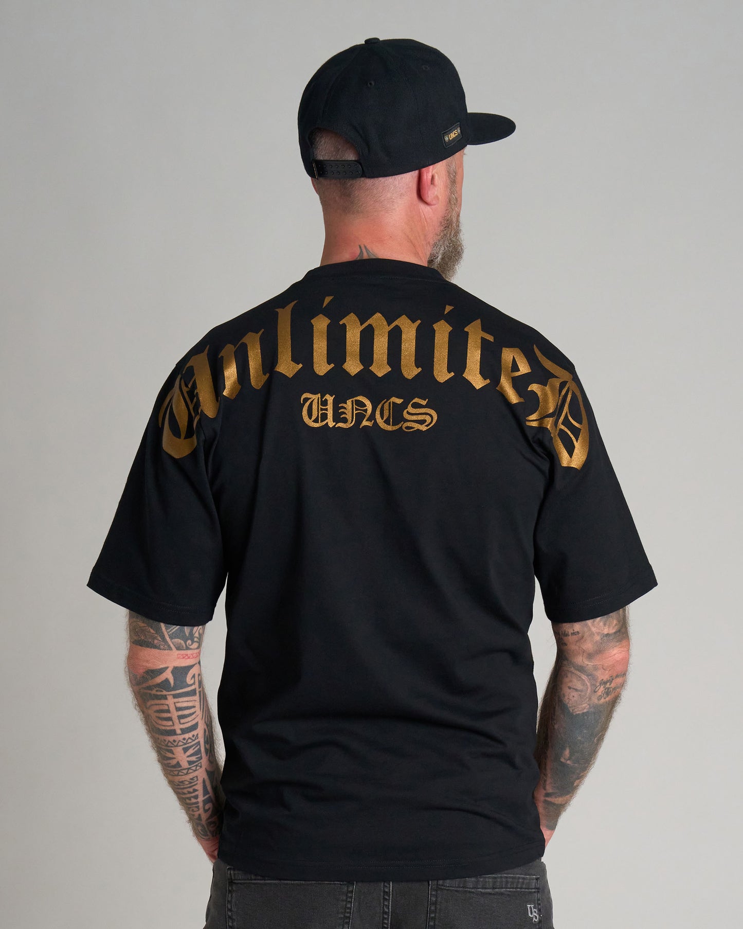 Férfi póló UNLIMITED (OVERSIZE) BLACK/GOLD