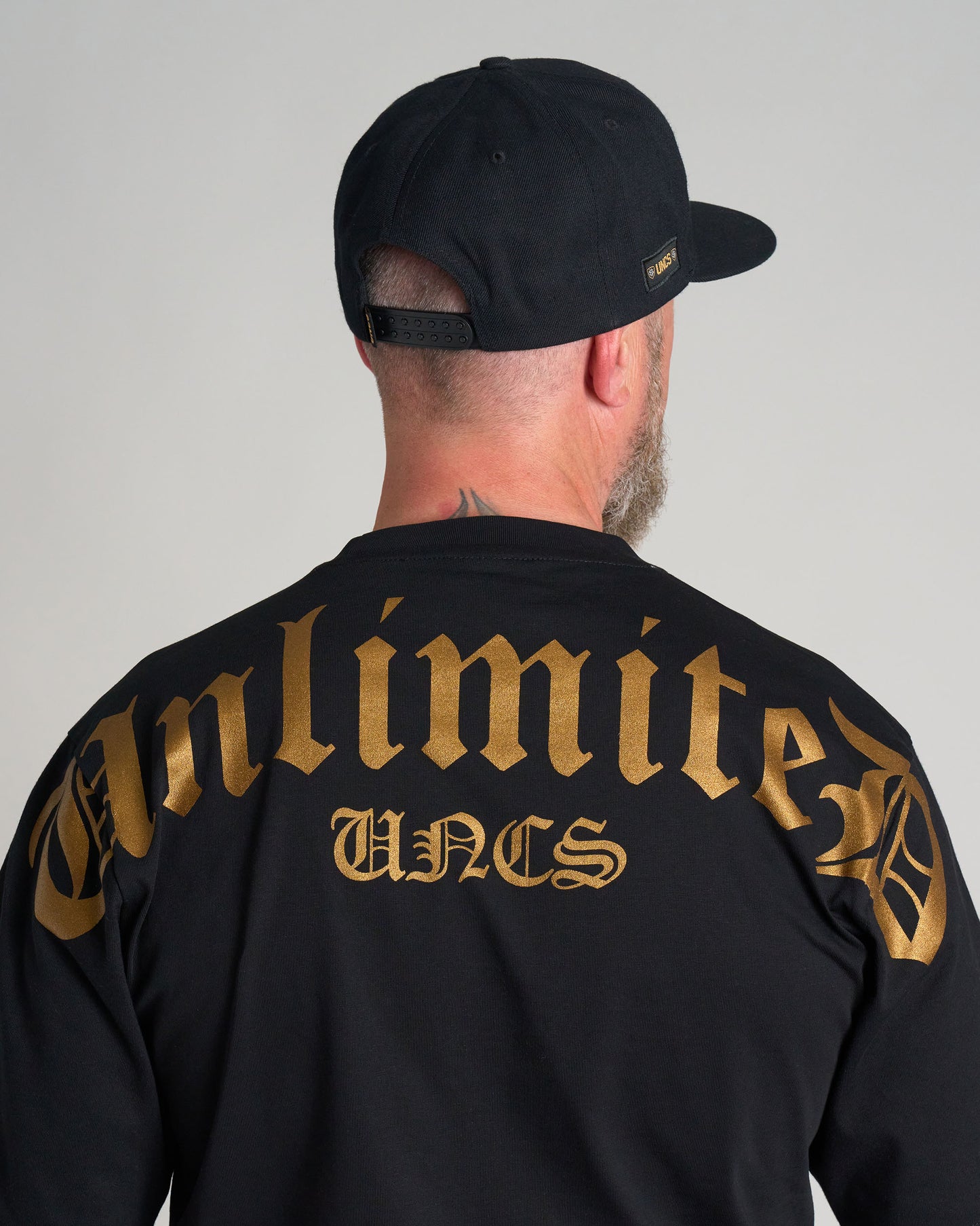 Férfi póló UNLIMITED (OVERSIZE) BLACK/GOLD