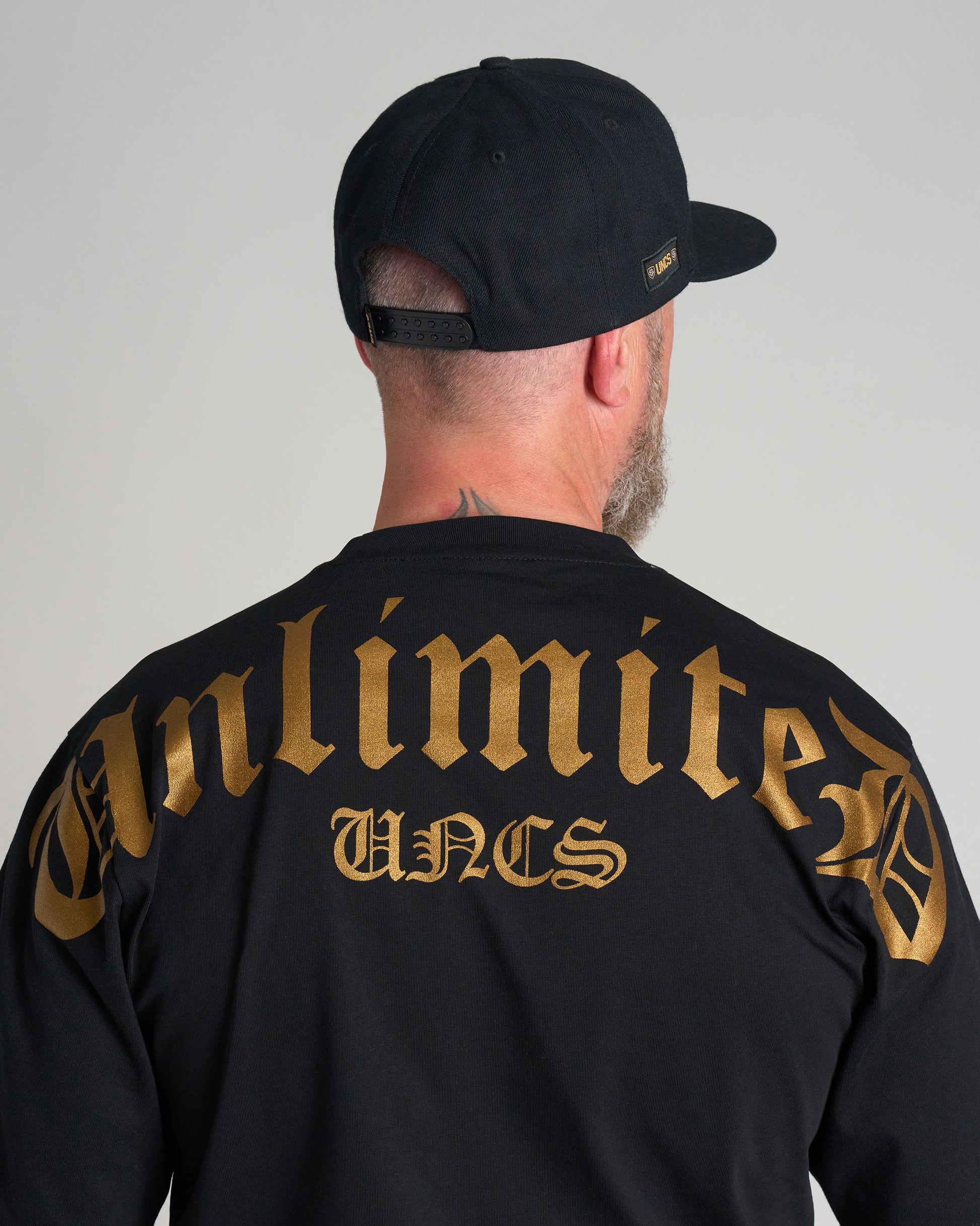 Férfi póló UNLIMITED (OVERSIZE) BLACK/GOLD