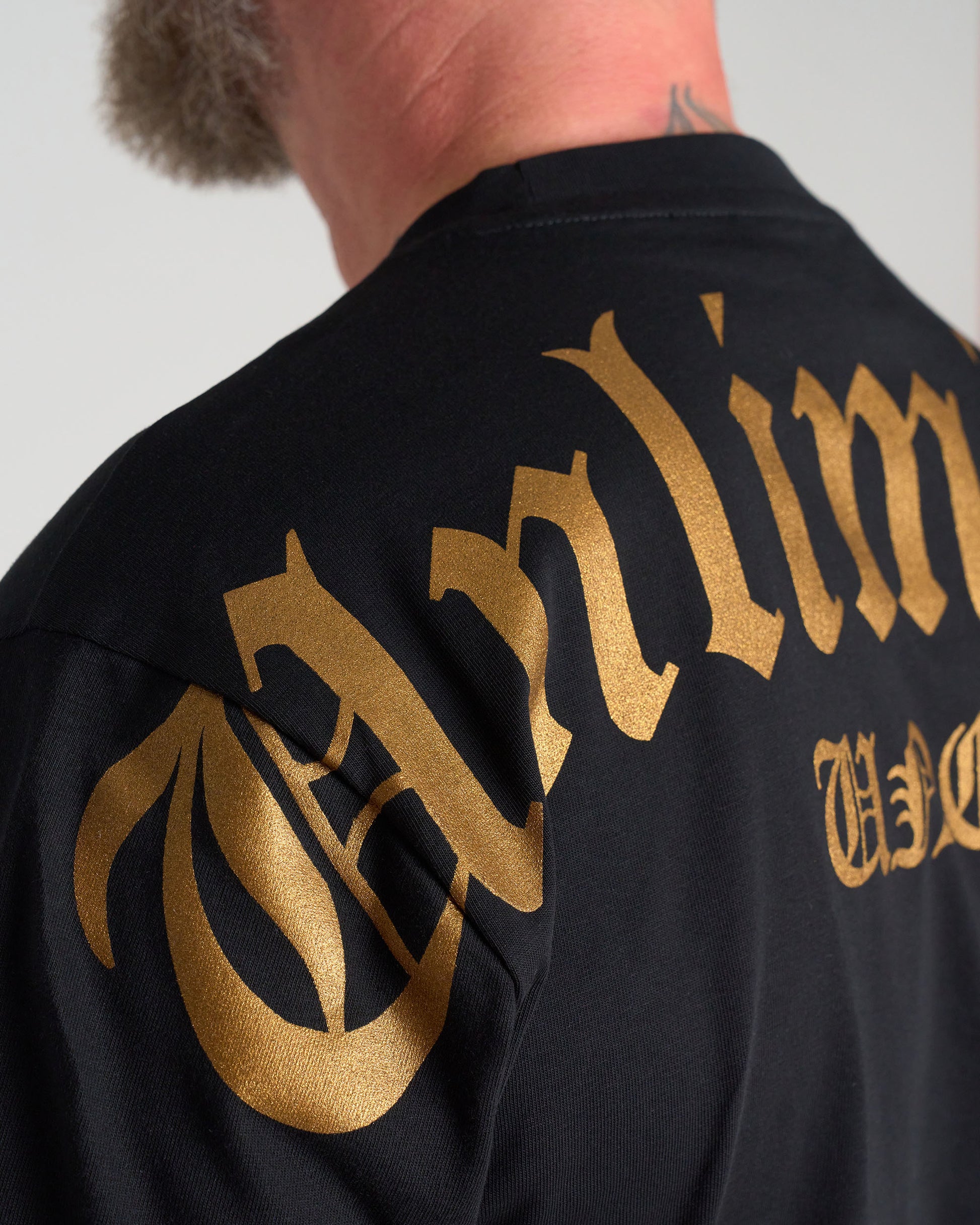 Férfi póló UNLIMITED (OVERSIZE) BLACK/GOLD